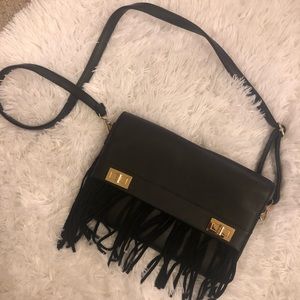 Black clutch with fringe